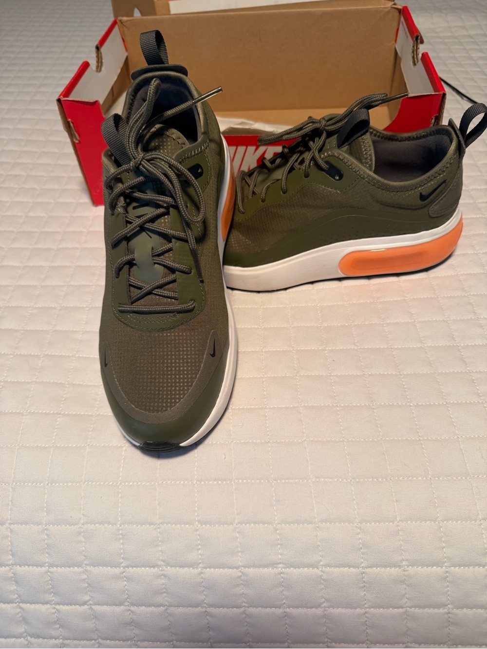 Nike women’s Olive Green Sneakers with Orange Accent